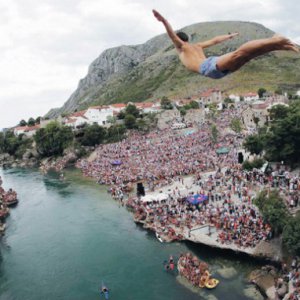 Jumping off a bridge in Mostar